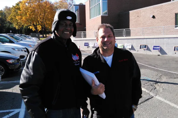 Esker handing out sample ballots at a polling place