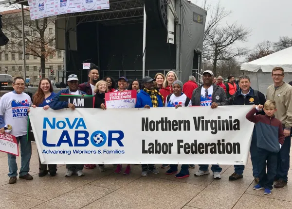 NOVA Labor members holding the nova labor banner at the national day of action